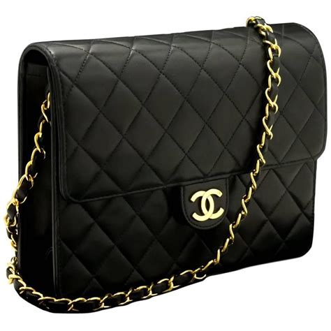 black chanel bag gold chain|black chanel shoulder bag.